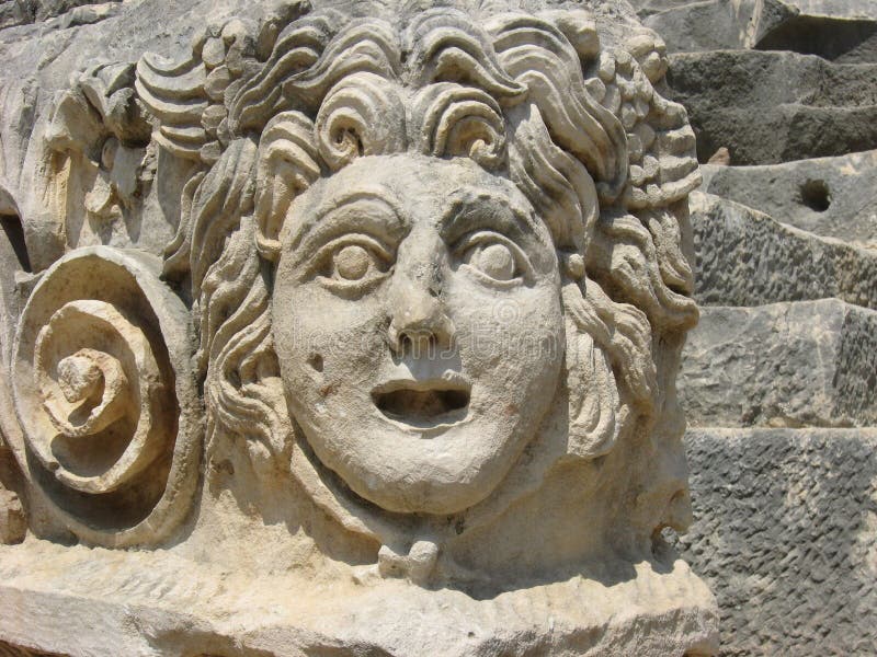 Stone mask of Medusa Gorgon. Photo taken in ancient theatre of Myra &#x28;modern turkish city Demre, Antalya region, Turkey&#x29;. Stone mask of Medusa Gorgon. Photo taken in ancient theatre of Myra &#x28;modern turkish city Demre, Antalya region, Turkey&#x29;