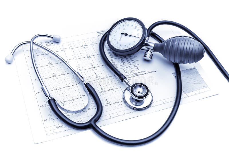 Stethoscope and blood pressure gauge lying on the ECG chart. Stethoscope and blood pressure gauge lying on the ECG chart