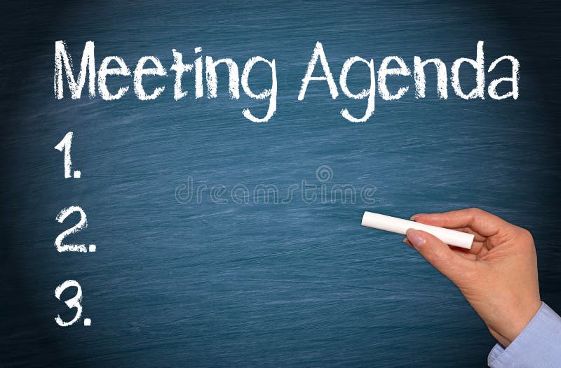 Meeting Agenda - female hand with chalk writing text