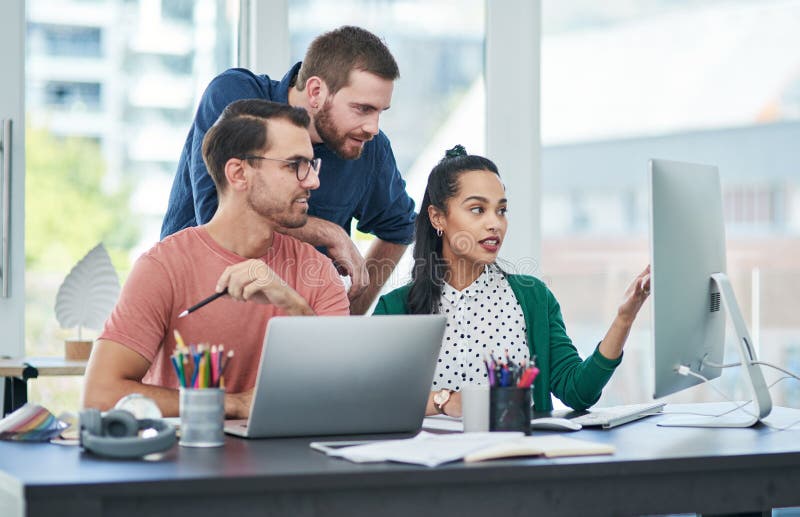 Meeting, computer and business people in creative office for planning, feedback or review for website development royalty free stock image