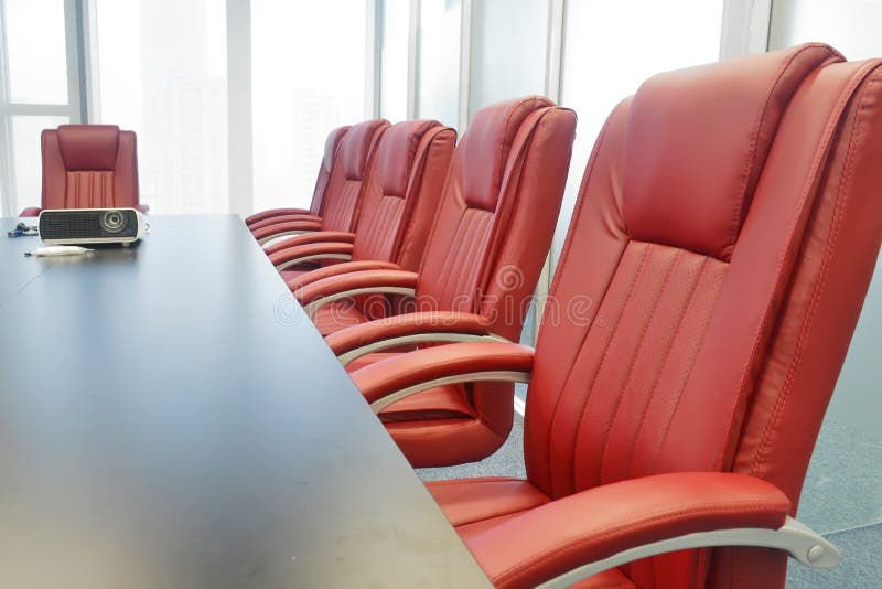 Close - up of Red Leather Chairs in Meeting Room stock photography