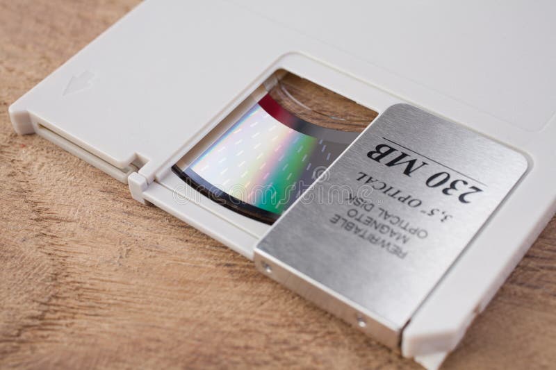 230 Megabyte Magneto optical Disc And Recording Surface Of This MO Disc 230-megabyte-magneto-optical-disc-and-recording-surface-of-this-mo-disc