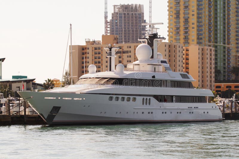 Megayacht docked in front of a condominium. Shot while boating with a canon 350d and 70-200mm L Lens.