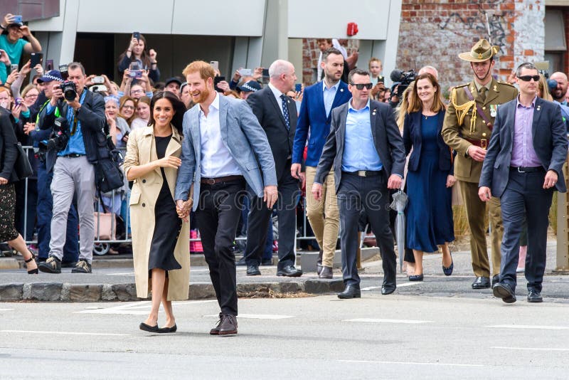 Melbourne, Victoria / Australia October 18 2018. Prince Harry and Meghan smiling and holding hands while visiting Melbourne. Melbourne, Victoria / Australia October 18 2018. Prince Harry and Meghan smiling and holding hands while visiting Melbourne
