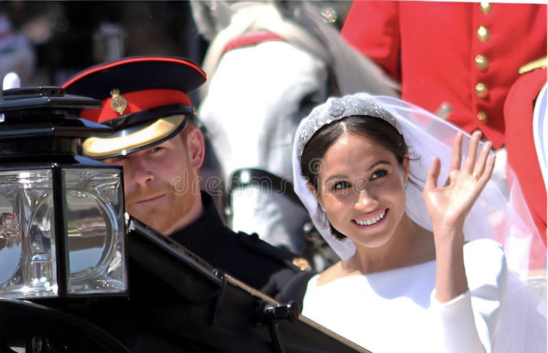 Meghan Markle Prince Harry Wedding, Windsor, Uk - 19.5.2018: Prince Harry and Meghan Markle wedding carriage in streets of Windsor then Windsor Castle Meghan waving to crowds stock Photograph, picture. Meghan Markle Prince Harry Wedding, Windsor, Uk - 19.5.2018: Prince Harry and Meghan Markle wedding carriage in streets of Windsor then Windsor Castle Meghan waving to crowds stock Photograph, picture