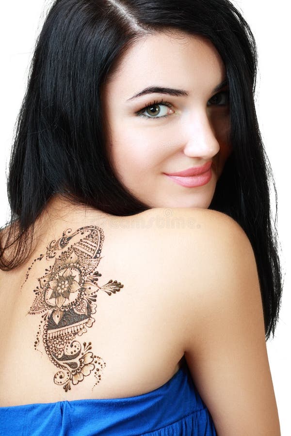 Beautiful girl portrait painted Mehandi fresh applied henna on her back. Beautiful girl portrait painted Mehandi fresh applied henna on her back