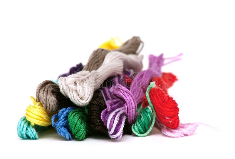 Multicolored cotton threads on white background. Multicolored cotton threads on white background