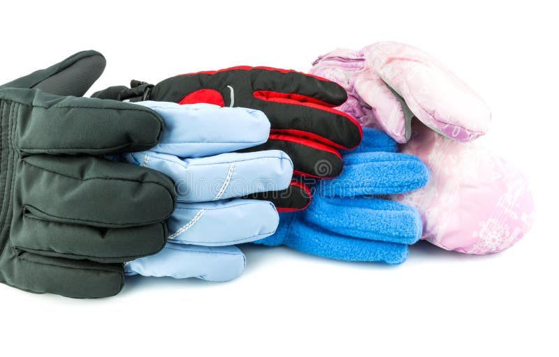 Multicolored ski gloves varied in size isolated on white background. Multicolored ski gloves varied in size isolated on white background