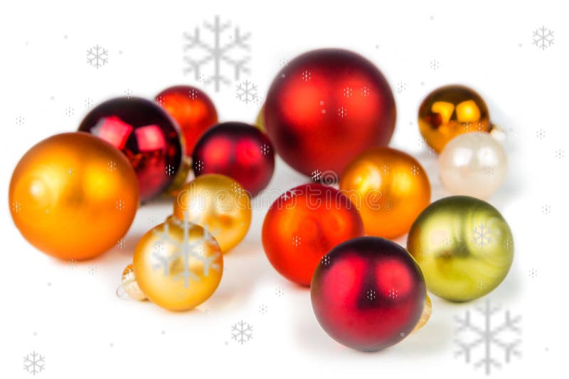 Multicolored christmas balls on white background with snowflakes everywhere. Multicolored christmas balls on white background with snowflakes everywhere