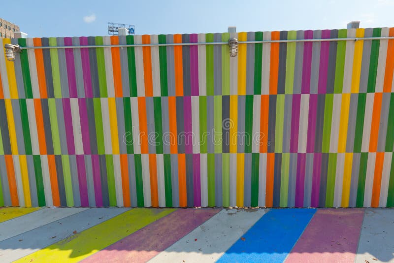 Multicolored painted sidewalk and walls in Brooklyn, New York. Multicolored painted sidewalk and walls in Brooklyn, New York.