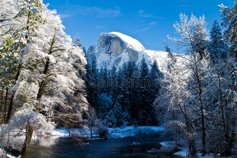 Yosemite half dome covered in snow in winter. Yosemite half dome covered in snow in winter