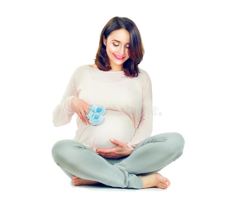 Meio grávido mulher envelhecida que toca em sua barriga Conceito saudável da gravidez imagens de stock royalty free Meio grávido mulher envelhecida que toca em sua barriga Conceito saudável da gravidez imagens de stock royalty free
