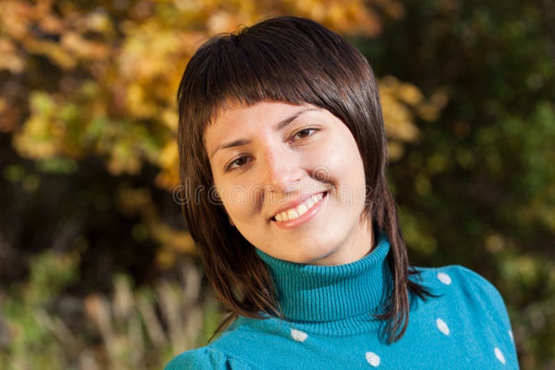 Portrait of the nice girl-brunette against the autumn nature. Portrait of the nice girl-brunette against the autumn nature.