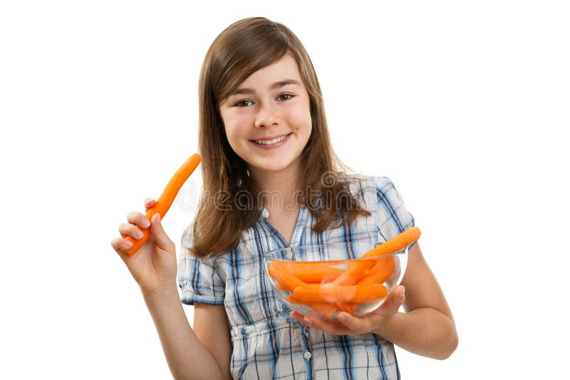 Girl holding fresh carrots isolated on white background. Girl holding fresh carrots isolated on white background