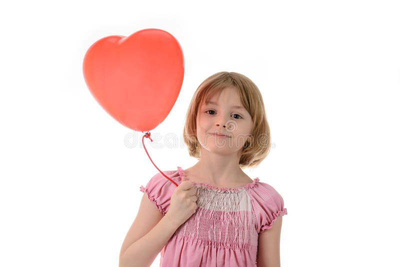 Meisje die in roze kleding een ballon houden royalty-vrije stock fotografie Meisje die in roze kleding een ballon houden royalty-vrije stock fotografie