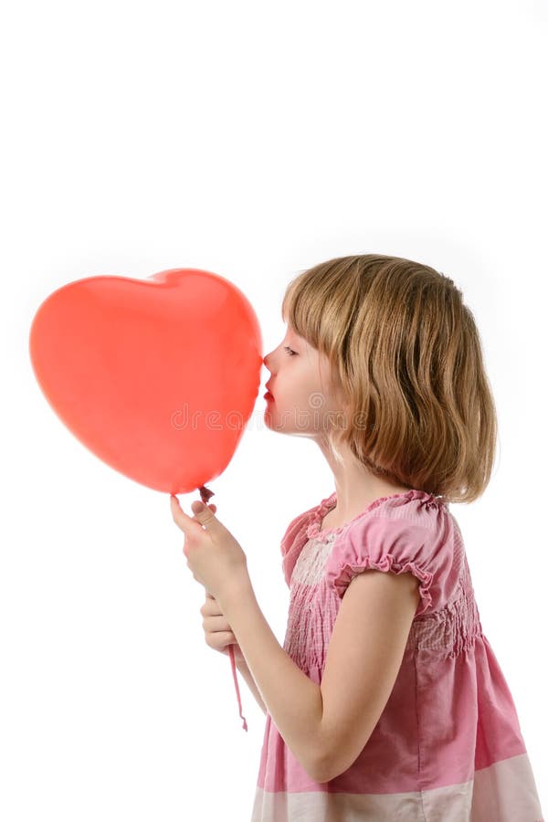 Meisje die in roze kleding een ballon houden stock fotografie Meisje die in roze kleding een ballon houden stock fotografie