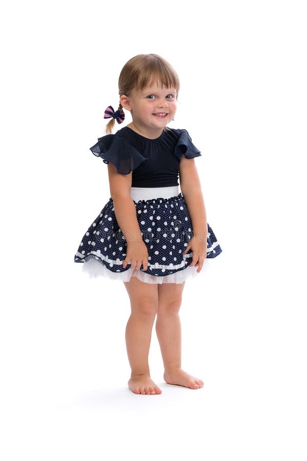 Meisje in een stipkleding in studio stock afbeeldingen Meisje in een stipkleding in studio stock afbeeldingen