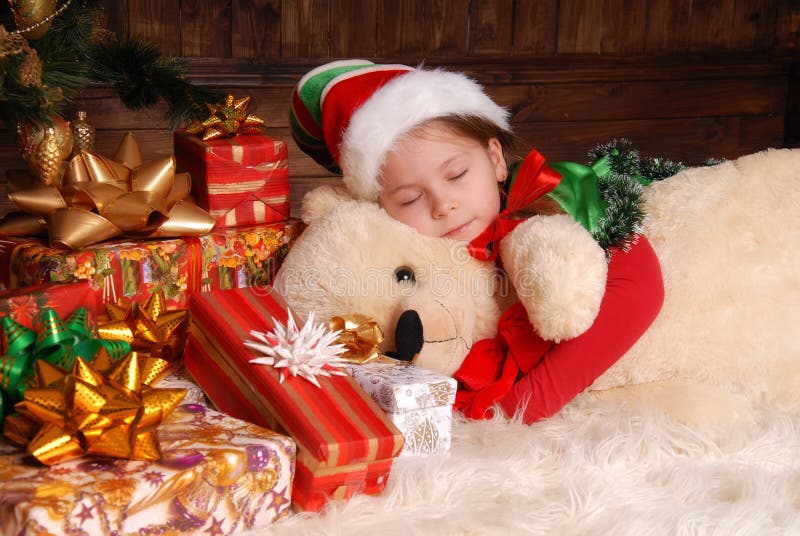 Meisje in kostuum van het Kerstmiself stock foto's Meisje in kostuum van het Kerstmiself stock foto's
