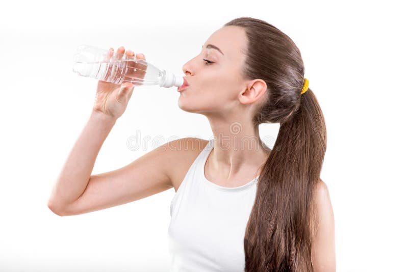 Meisjes drinkwater stock afbeeldingen Meisjes drinkwater stock afbeeldingen