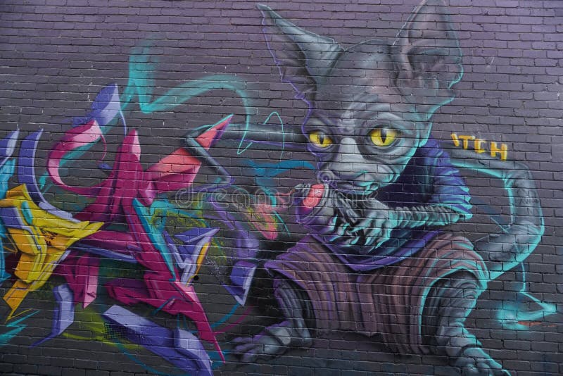 MELBOURNE, AUSTRALIË - AUGUSTUS 15 2017 - Muurschilderijengraffiti murales op stadsstraten stock foto MELBOURNE, AUSTRALIË - AUGUSTUS 15 2017 - Muurschilderijengraffiti murales op stadsstraten stock foto
