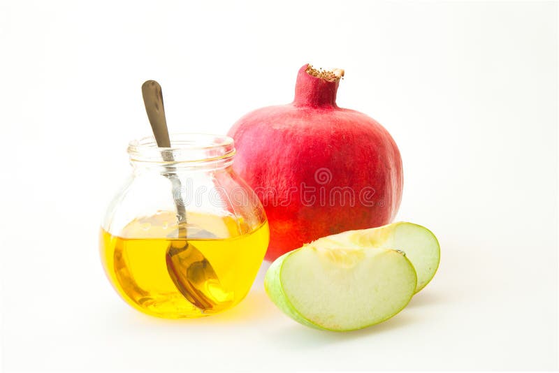 Melograno e mela del miele di hashana di Rosh fotografia stock Melograno e mela del miele di hashana di Rosh fotografia stock