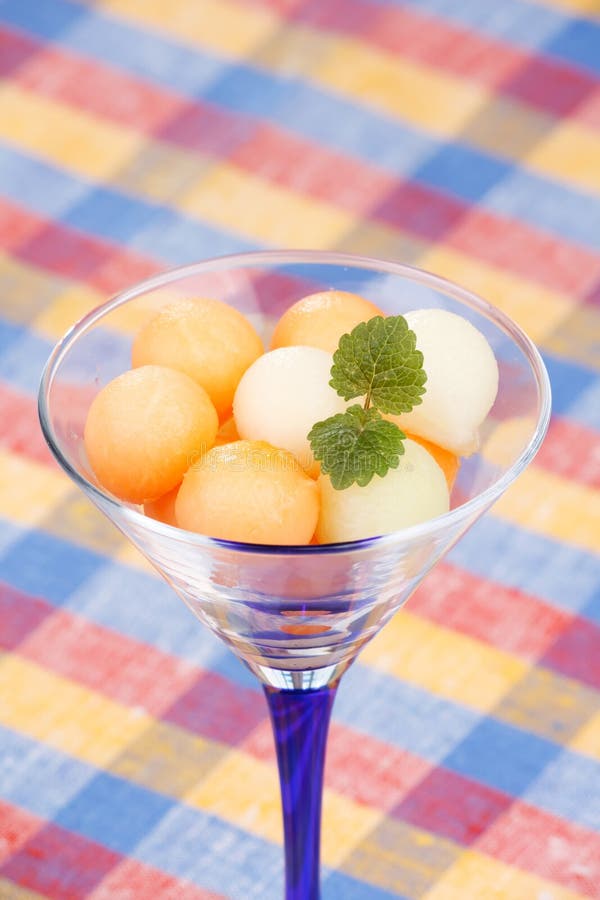 Melon balls with mint stock image. Image of melon, background 10544323
