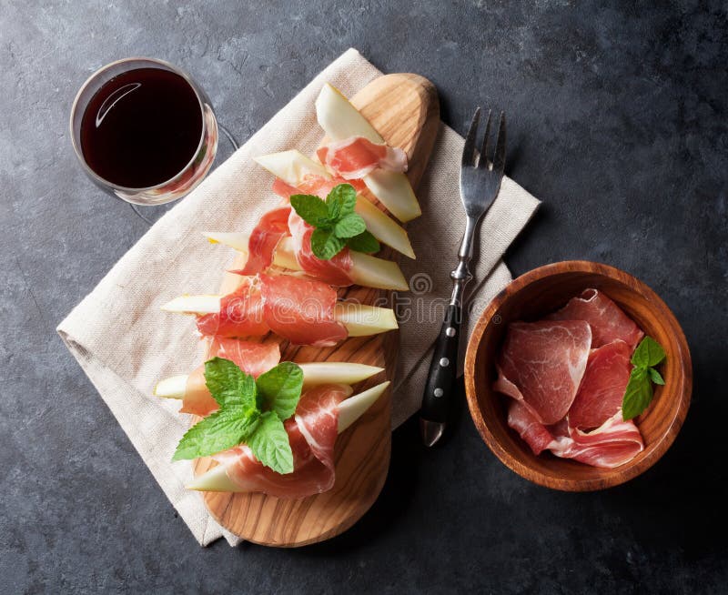 Melon with Prosciutto and Basil Stock Photo Image of meal, cantaloupe