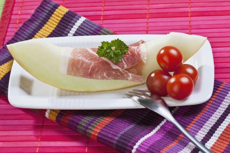 Melon, parma ham, chive stock image. Image of healthy 25186505
