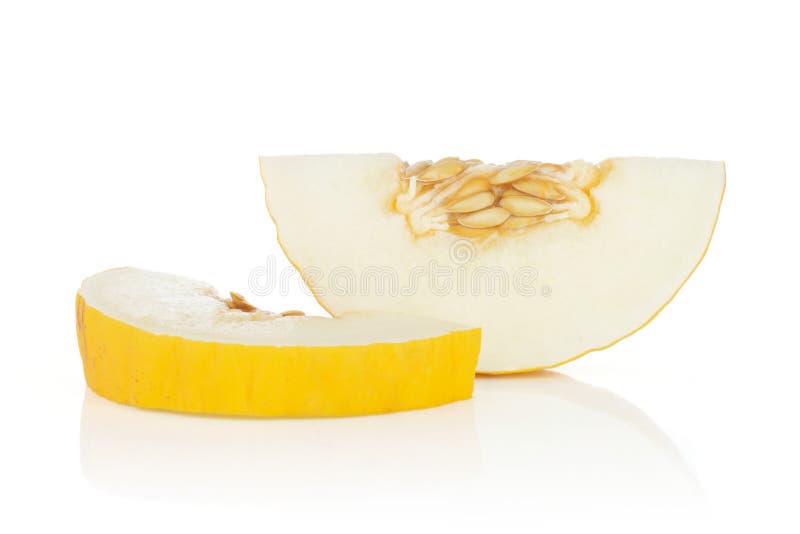 Melone color giallo canarino giallo isolato su bianco fotografia stock Melone color giallo canarino giallo isolato su bianco fotografia stock