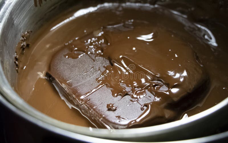 Melted Chocolate in Pan Under a Water Bath. Making Hot Chocolate at