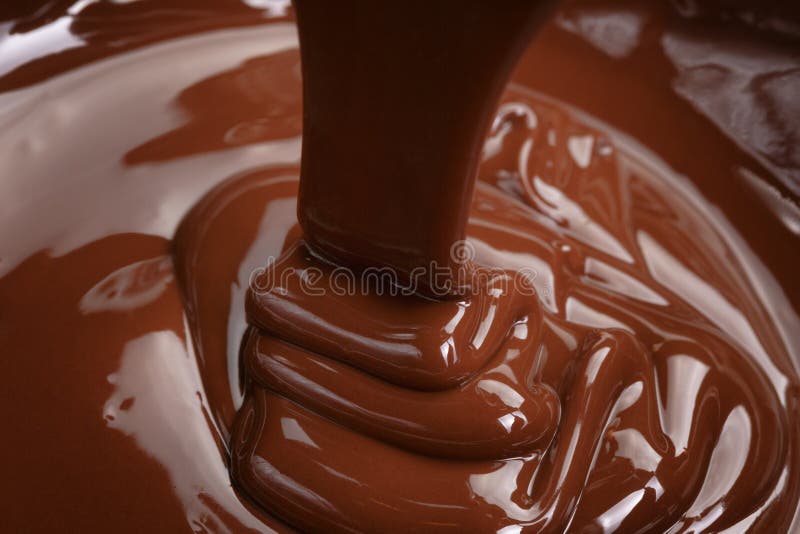 Melting chocolate drips. Chocolate isolated on white background. Stock  Photo