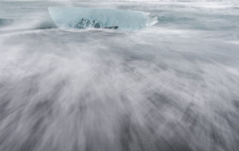 Floating Ice on Jokulsarlon Glacier Lake in Ultraviolet at Sunrise