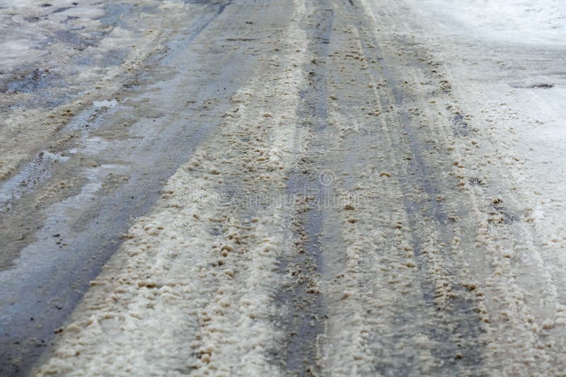 Melting Snow on Asphalt Snow and Dirt Stock Photo Image of urban
