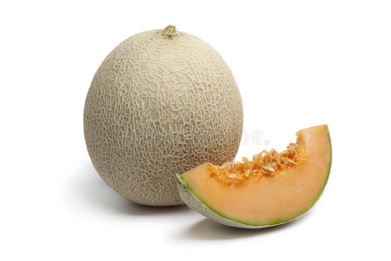 Melón cantalupo con una rodaja fotos de archivo
