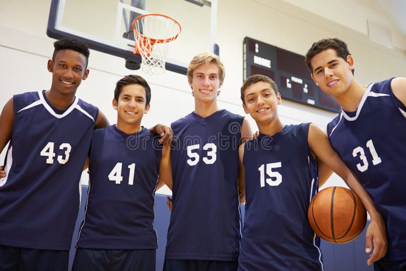 Membri della squadra di pallacanestro maschio della High School fotografia stock libera da diritti Membri della squadra di pallacanestro maschio della High School fotografia stock libera da diritti