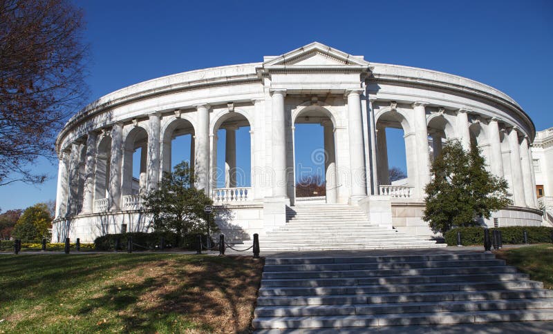 Southern entrance to the memorial amphitheater at the Tomb of the Unknown Soldier in Arlington National Cemetery in Virginia. It is an open-air venue used as a place of assembly for the purpose of paying tribute to American defenders. Southern entrance to the memorial amphitheater at the Tomb of the Unknown Soldier in Arlington National Cemetery in Virginia. It is an open-air venue used as a place of assembly for the purpose of paying tribute to American defenders.