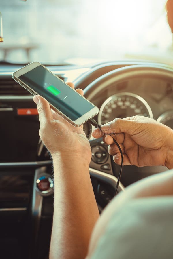 Men Charging Smart Phones In The Car Stock Image Image of interior