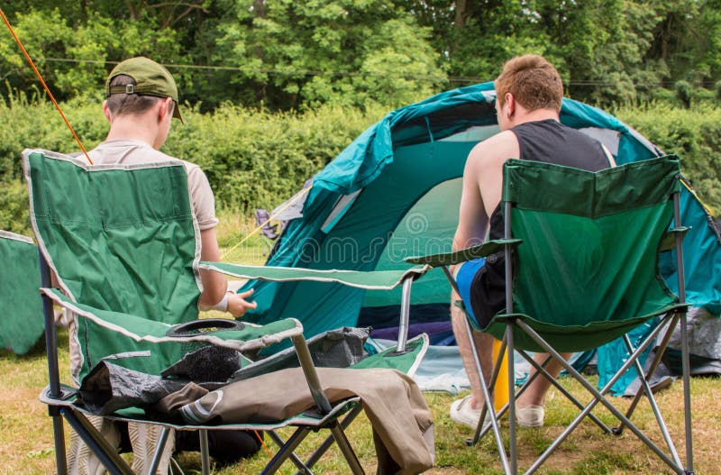 Men enjoying camping stock photo. Image of recreation 123582152