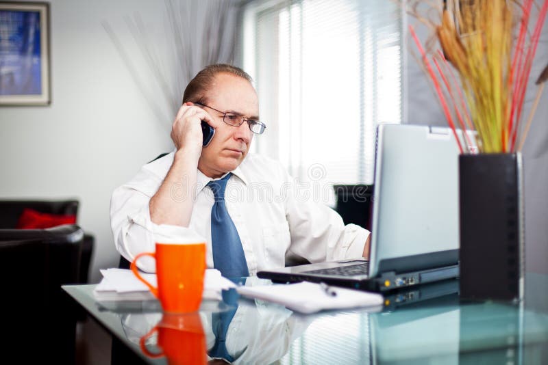 Men at home talking on the phone