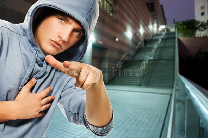 Men in a hood outdoors royalty free stock images