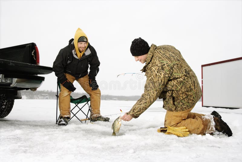 Men Ice Fishing royalty free stock image
