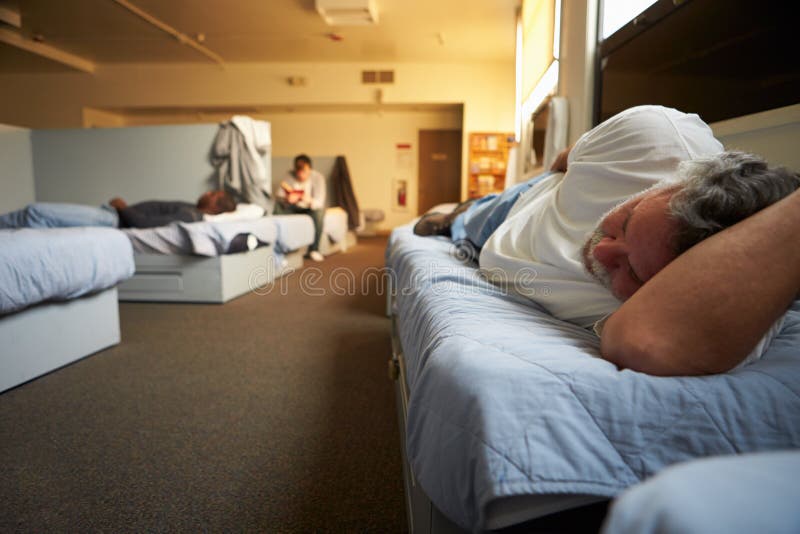 Women Lying on Beds in Homeless Shelter Stock Photo Image of person