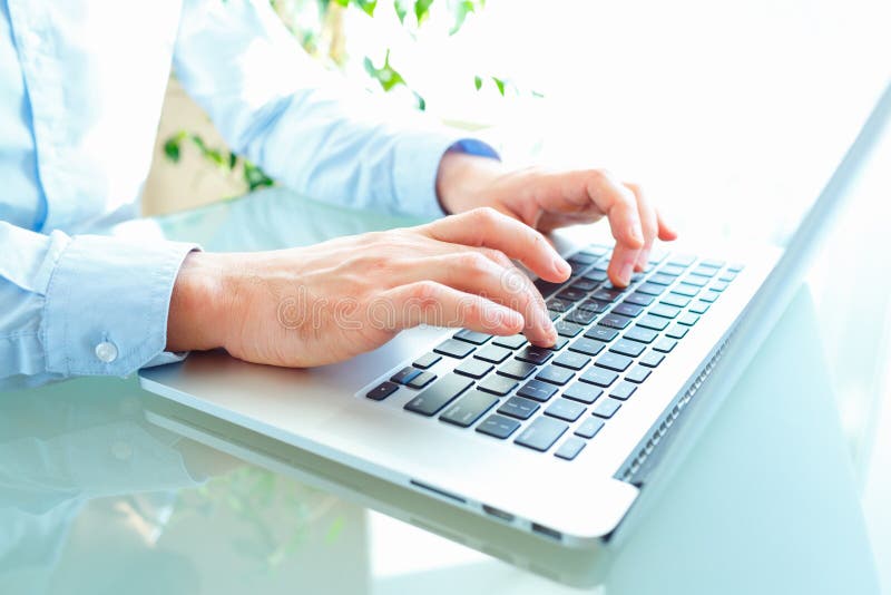 Men office worker typing on the keyboard royalty free stock photos Men office worker typing on the keyboard royalty free stock photos