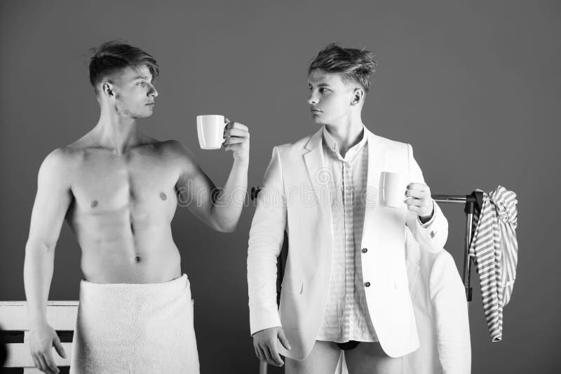 Men posing with cups royalty free stock photo Men posing with cups royalty free stock photo
