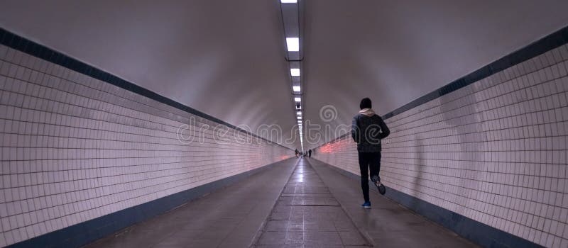 Men running in an tunnel royalty free stock photos Men running in an tunnel royalty free stock photos