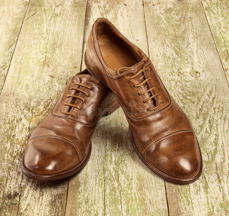 Men`s Classic Brown Leather Shoes on the Wood Floor. Stock Image ...