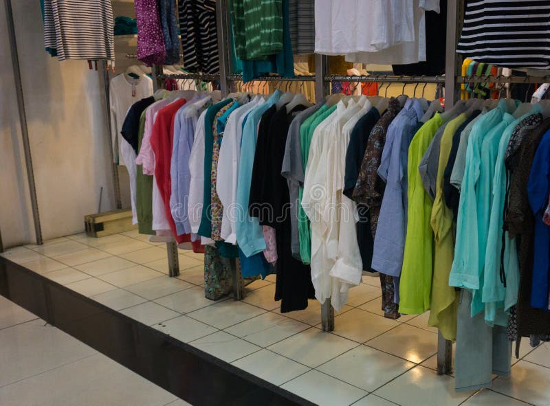 Men`s clothes hanging on the rack display photo taken in Jakarta Indonesia stock photo Men`s clothes hanging on the rack display photo taken in Jakarta Indonesia stock photo