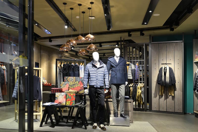 Interior view of men's fashion shop,Hongkong,China,Asia. decorated with pendant lamp and led light. Interior view of men's fashion shop,Hongkong,China,Asia. decorated with pendant lamp and led light