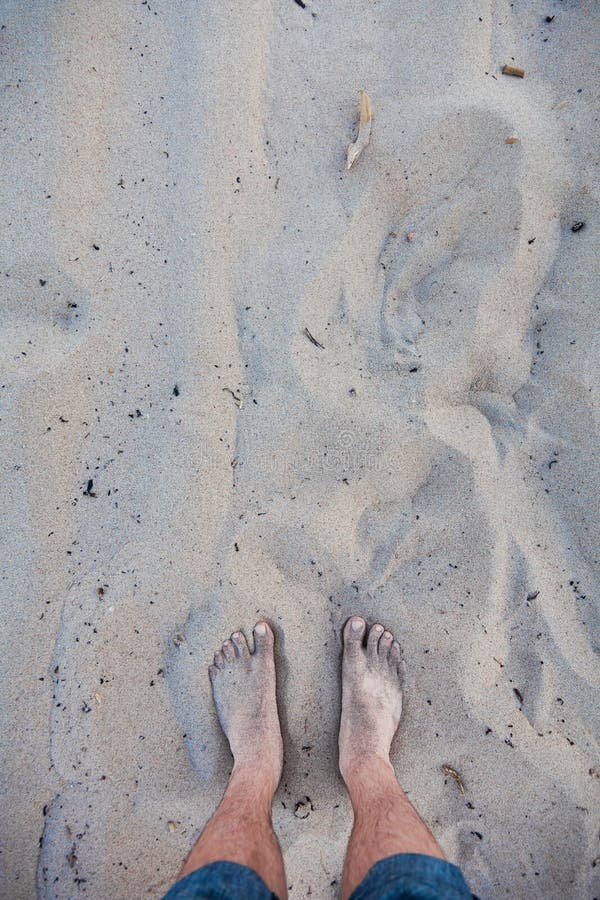 Men S Barefoot Feet in the Sand Stock Photo Image of caucasian, denim