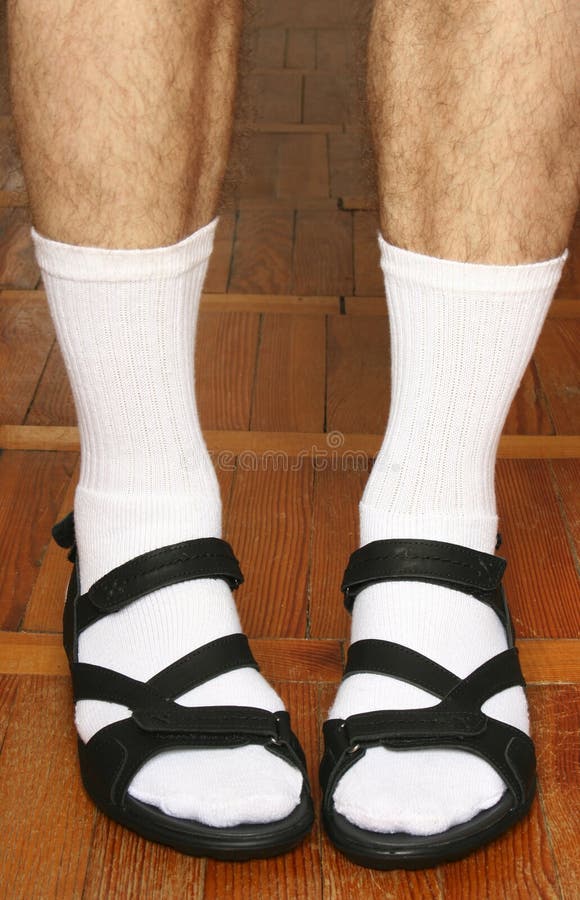 Men s feet in sandals stock photo. Image of socks, legs 66251324